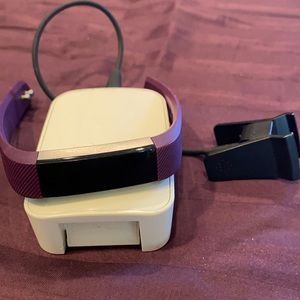 Purple Fitbit new I wore it once comes with charg